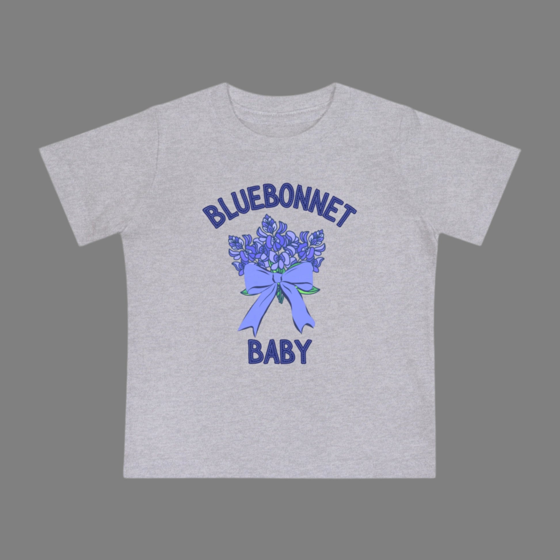 Image: This baby t-shirt showcases the beauty of Texas wildflowers with a detailed bluebonnet design. Ideal for springtime adventures, it’s a perfect outfit for bluebonnet field photos, Easter gatherings, or everyday wear. The lightweight fabric ensures breathability and comfort, making it a great gift for baby showers or first birthdays. A must-have for little Texans who love nature, this floral tee adds charm to any wardrobe, by jaecrece.