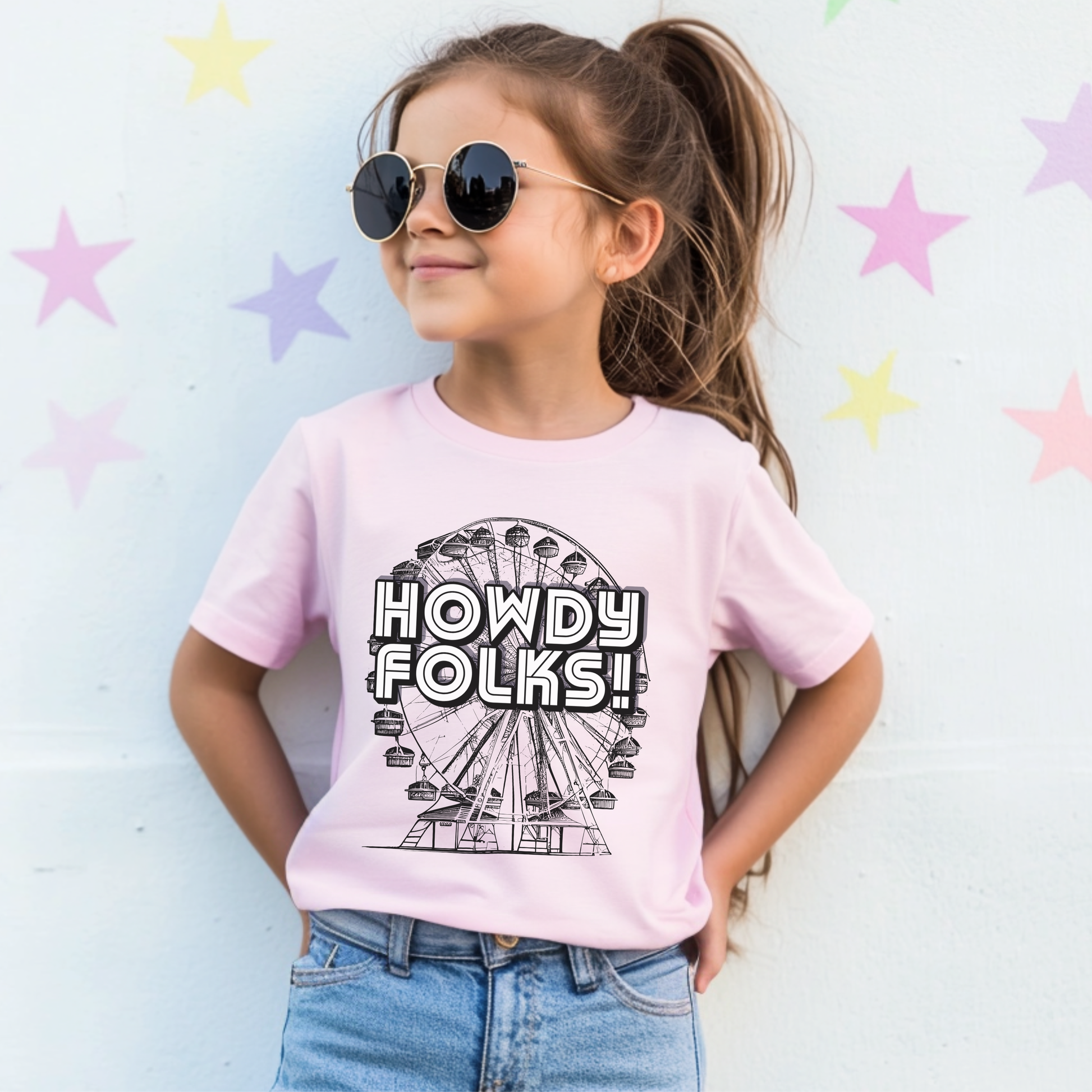 Texas State Fair kids shirt featuring a vintage inspired Ferris wheel graphic with bold HOWDY FOLKS lettering. This colorful youth tee captures the nostalgic fun of carnival rides, fairgrounds, festivals, and classic State Fair days. Perfect for children visiting the State Fair of Texas, family fair outings, fall festivals, and photos, with matching adult sizes available for coordinated family outfits.
