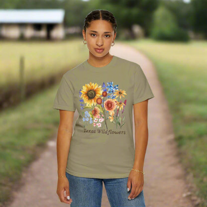Texas wildflower tee in Comfort Colors style with bluebonnet graphics and a pastel floral print. This soft girl, Southern-style shirt celebrates spring blooms and Texas pride. A beautiful gift for nature lovers or festivalgoers, it’s breathable, comfy, and perfect for casual looks inspired by wildflower drives and spring landscapes.