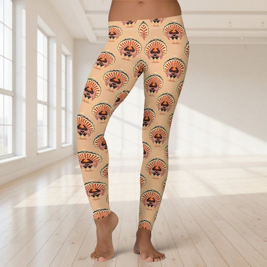 Thanksgiving Turkey Love ladies leggings. These womens yoga pants are peach, and have a repeating pattern of turkeys showing the love sign with their hands. These womens tights make a great gift, or a family matching outfit for the Turkey Trot! by jaecrece