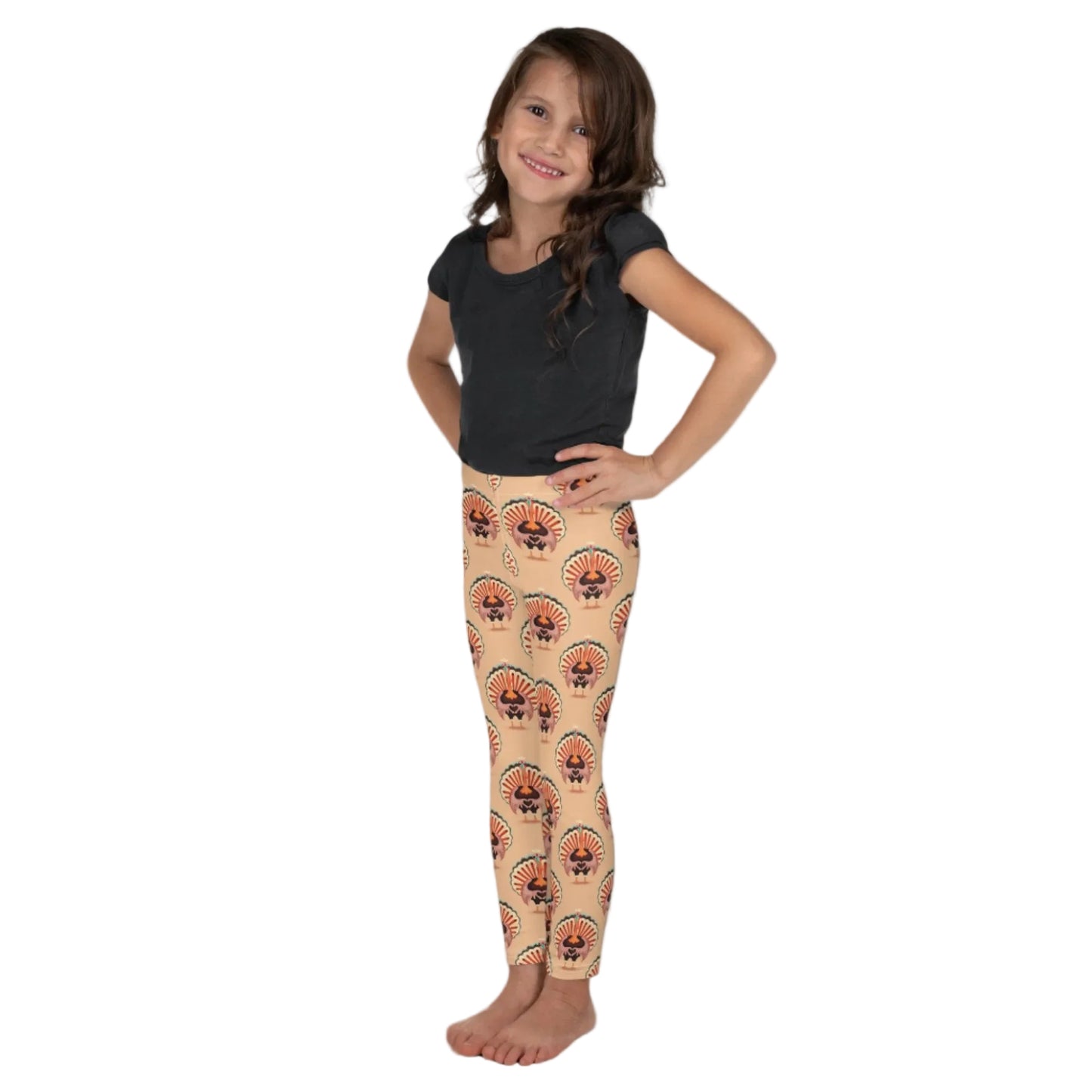 Thanksgiving Turkey Love Toddler leggings. These yoga pants are peach, and have a repeating pattern of turkeys showing the love sign with their hands. These girls child tights make a great gift, or a family matching outfit for the Turkey Trot! by jaecrece