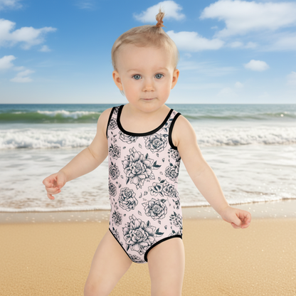 Pink floral swimsuit for toddlers and girls featuring dark blue vintage rose artwork with a timeless look. Available in one piece sizing from 2T to 20.