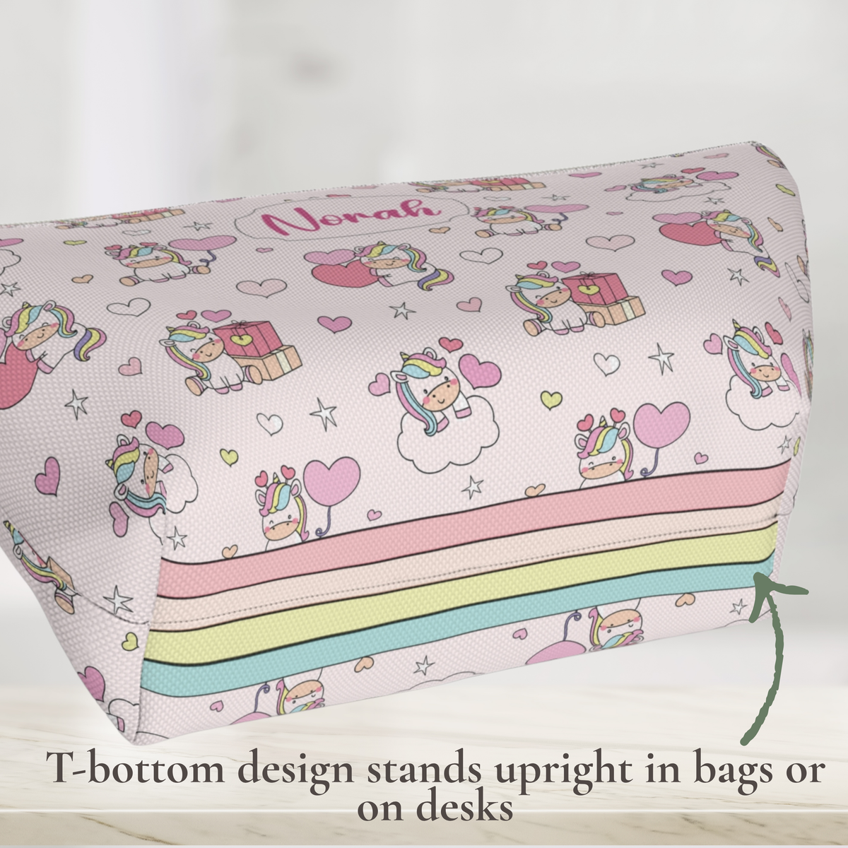 Personalized unicorn zipper pouch showing the T bottom design that helps the bag stand upright. The pastel rainbow unicorn pouch has a whimsical cutecore aesthetic and custom name personalization, making it a cute girls makeup bag, toiletry pouch, pencil pouch or travel accessory.