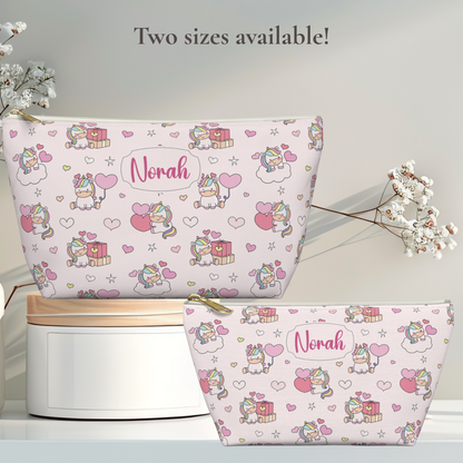 Personalized unicorn zipper pouch featuring a pastel rainbow design with colorful unicorns, hearts, stars, clouds and gift details. The custom name adds a personal touch to this cute girls accessory, while the whimsical cutecore aesthetic makes it a fun choice for makeup, toiletries, school supplies, travel essentials, sleepovers or everyday organization.