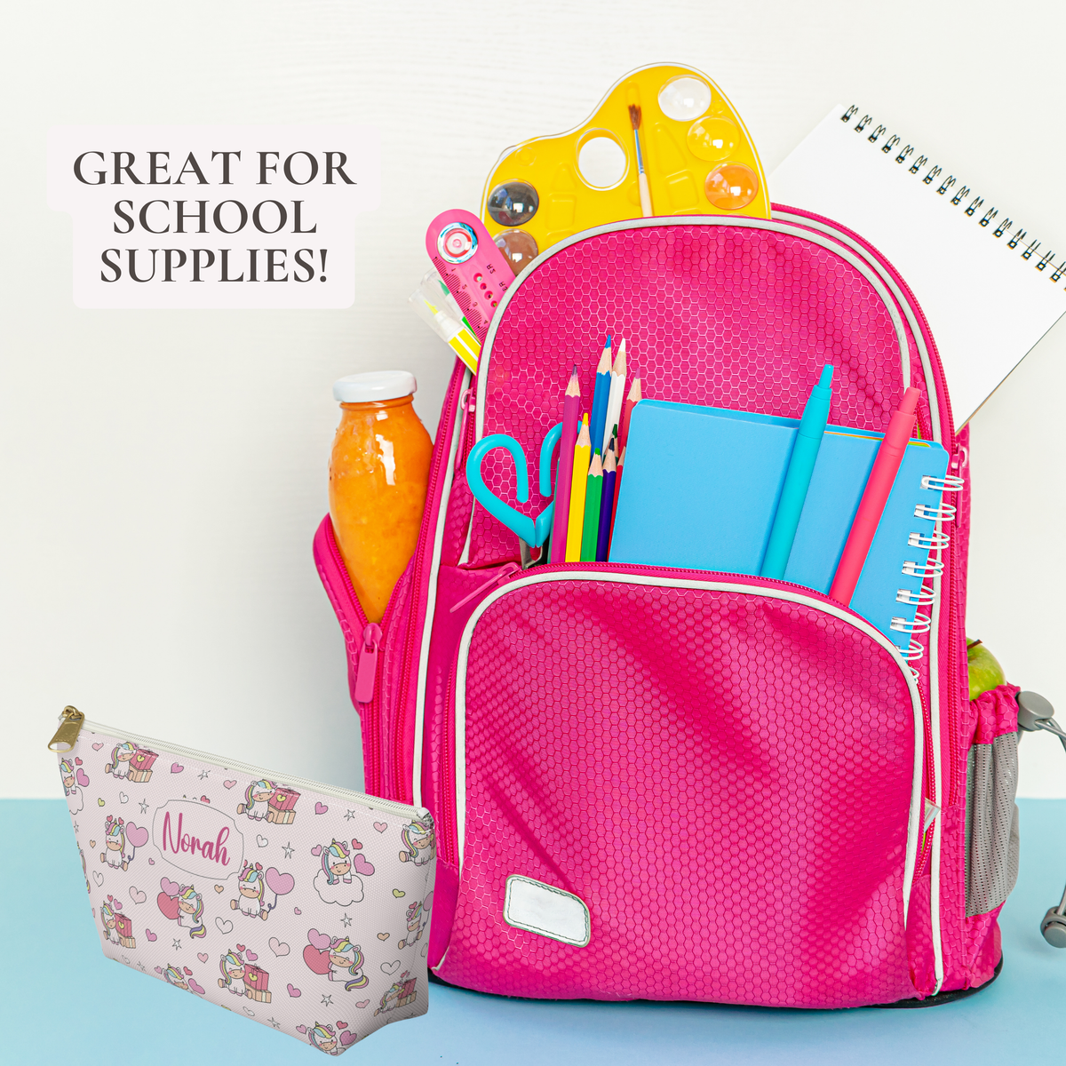 A personalized unicorn zipper pouch helps organize a backpack with school supplies and everyday essentials. The pastel rainbow design features colorful unicorns, hearts, stars and clouds in a cute whimsical aesthetic that fits the cutecore trend. This girls pencil pouch is useful for pens, pencils, small art supplies, accessories and other items that can get lost in a school bag.