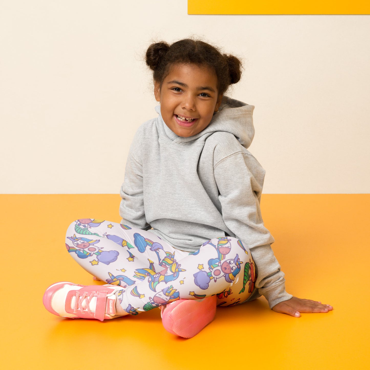 Girls mermaid unicorn leggings with a colorful fantasy print that includes clouds, stars, and whimsical ocean inspired elements. Made for toddlers and young girls, these leggings feature a high waist fit and full length design for comfortable everyday wear. The soft stretch fabric is ideal for school, play, and lounging. A fun and stylish clothing option for kids who love magical and playful aesthetic outfits.