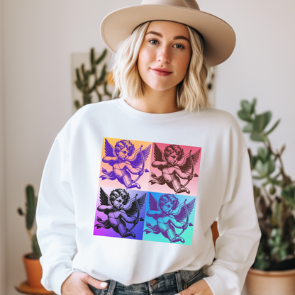 White Gildan 18000 sweatshirt featuring a pop art cupid design with four vibrant angel panels centered on the chest. This retro inspired graphic sweatshirt is designed for comfort with a relaxed unisex fit and body inclusive sizing from Small to 5XL. Available in black and white with matching child sizes and t shirt options, perfect for Mommy and Me outfits, Valentine themed outfits, and creative gift giving.