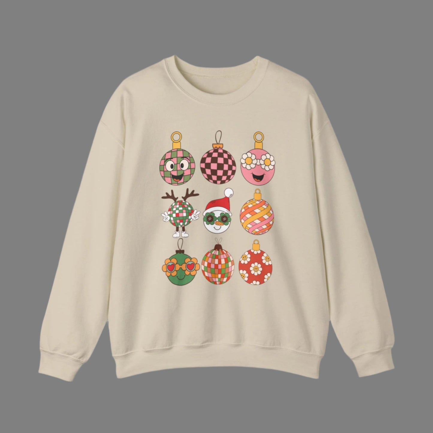 Groovy retro Christmas sweatshirt with nine ornament cartoon characters, including checkered, floral, striped, and a playful Santa. Designed in fun vintage style, this holiday crewneck comes in pink, black, or sand and is available in unisex sizes S–5XL. Cozy and festive, it’s the perfect holiday outfit, retro-inspired Christmas gift, or unique family photo sweatshirt. Printed on durable Gildan 18000 for warmth and everyday wear during the holiday season.