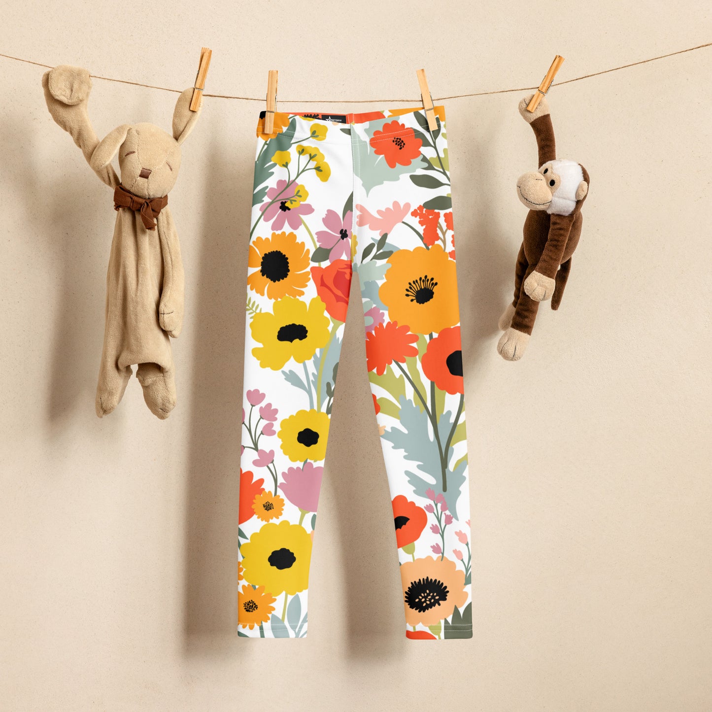 Image: Toddler girls floral leggings with a watercolor wildflower print in vivid spring colors. Ideal for sizes 2T to 7, these soft and breathable leggings make the perfect addition to your child’s seasonal wardrobe. Great for birthdays, spring break, or casual outings. Part of a mommy and me matching set, these toddler leggings are a must-have for stylish family moments, by jaecrece.