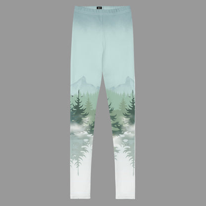 Winter Forest Kids Leggings in sizes 8–20 with nature-inspired snowy mountain and pine tree graphics. Part of a family matching activewear collection, perfect for winter holiday outfits, ski lodge vacations, cozy après-ski days, outdoor adventures, and family photos. Soft microfiber yarn with four-way stretch and durable overlock stitching. Made-to-order eco-friendly leggings for stylish, coordinated family winter looks.