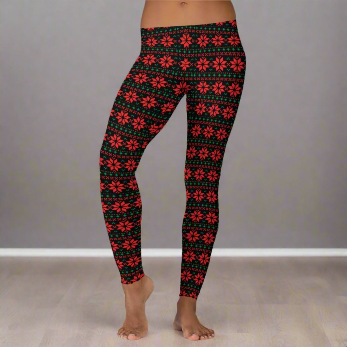 Women’s festive leggings with a black background and geometric poinsettia print in red and green, inspired by classic fair isle patterns. Mid rise fit and full length silhouette provide comfort and style for holiday parties, cozy nights, and everyday winter wear. Perfect for matching mommy and me outfits, family Christmas photos, and shoppers looking for unique holiday leggings with a floral twist.