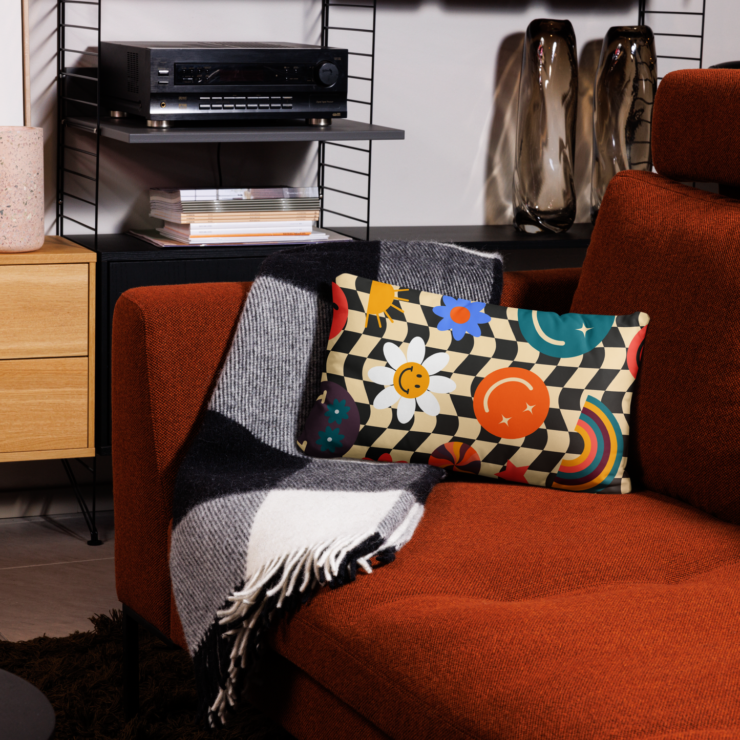 Rectangular Y2K smiley face checkerboard pillow shown on a couch, emphasizing the bold check pattern and bright smiley icons. Retro vibes and soft girl aesthetic bring playful energy to teen rooms, dorms, or cozy apartments. Double-sided printed pillow adds cheerful personality and comfort, making it a decorative accent perfect for gifting or stylish home décor updates.
