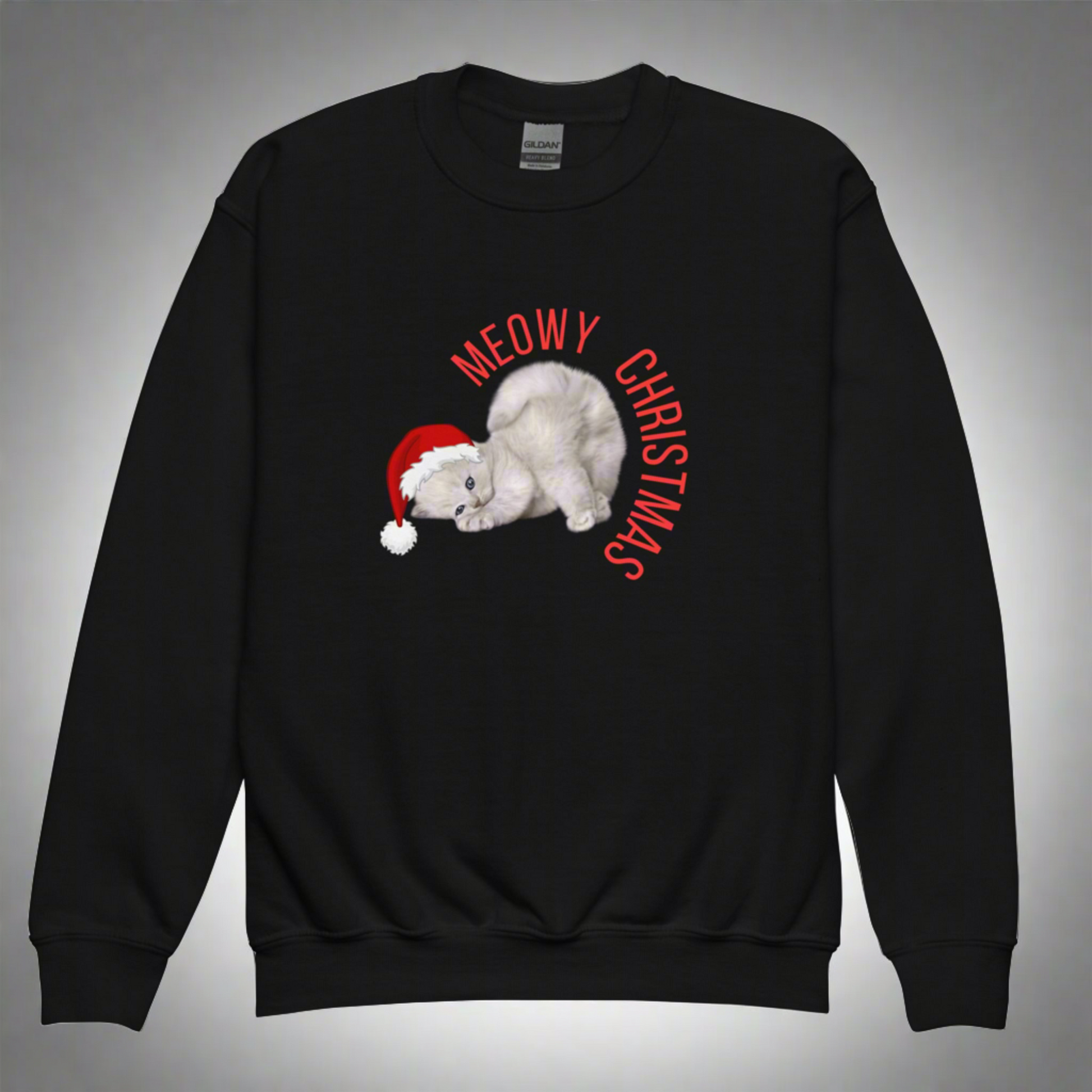 Youth Meowy Christmas Sweatshirt in sizes XS–XL features a festive holiday cat design with playful Christmas flair, perfect for cat-loving kids and tweens. This cozy unisex pullover makes a great gift for boys and girls who adore cats, Christmas sweaters, or funny holiday apparel. Ideal for holiday parties, classroom celebrations, or casual winter wear, this Christmas cat sweatshirt blends comfort and humor for a meowgical holiday season.