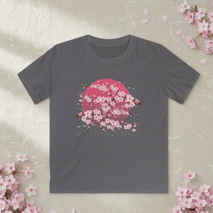 Youth cherry blossom graphic t shirt featuring delicate pink sakura blossoms and a moon inspired design. This Japanese inspired floral tee is made for kids who love artistic, nature inspired, and cute graphic shirts.