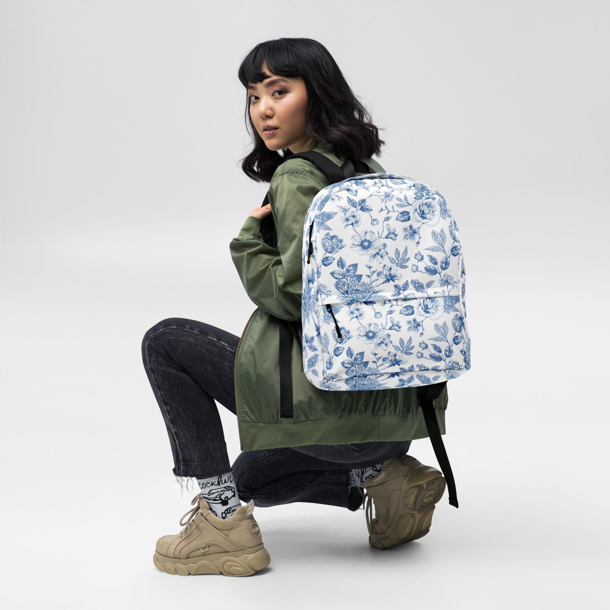 Celebrate timeless elegance with this custom Blue Toile Backpack, perfect for girls, teens, and new moms needing a chinoiserie diaper bag. Featuring a classic toile de jouy design, this versatile backpack is ideal for school, travel, or horse shows. Personalized with your chosen name, it makes a thoughtful baby shower gift, book bag, or stylish lunchbox. Add French vintage flair to everyday outings.
