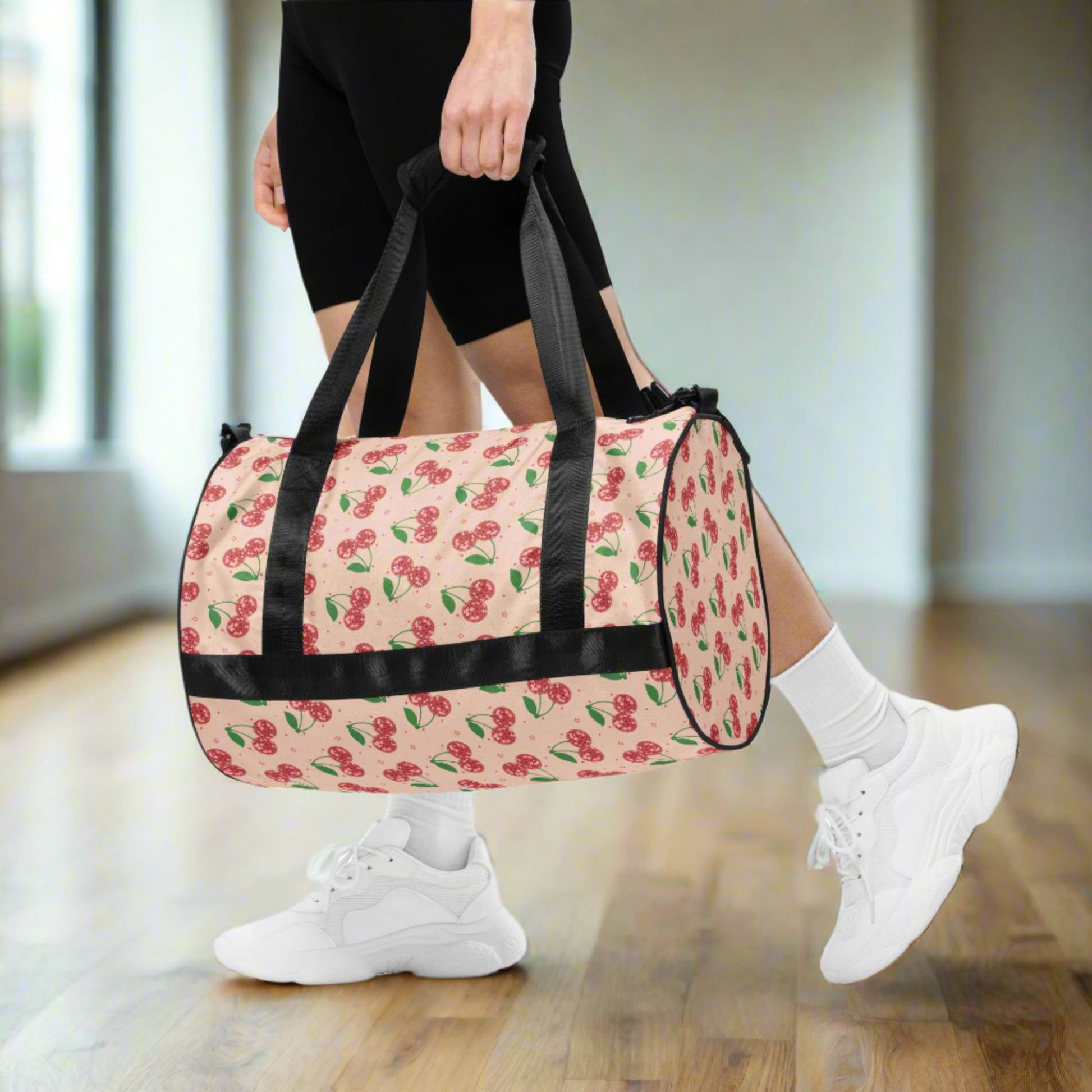 Disco Cherry Gym Bag. This pink athletic duffel bag features a red cherry mirror ball pattern with stars. The perfect bag for overnight trips, Bachelorette parties, or a gift for your favorite teen or tween dancer, by jaecrece