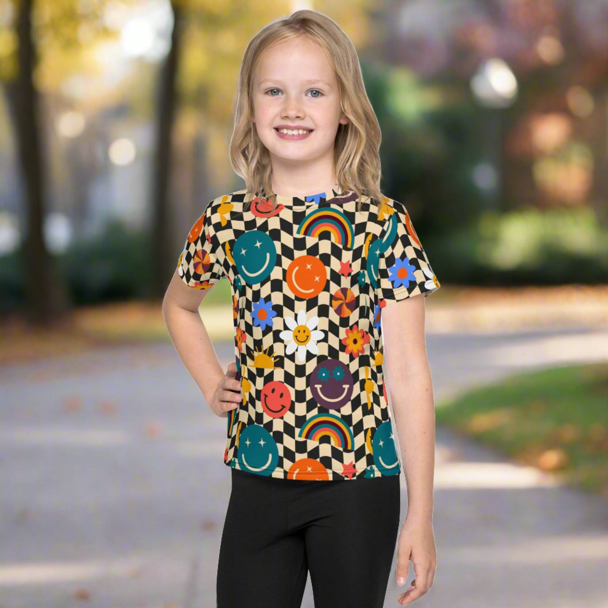 Smiley Face Checkerboard Kids Crew Neck T-Shirt Smiley Face Checkerboard Girls Leggings. This cute retro shirt features a black and khaki checkerboard background, with smiley face, rainbow and daisy graphics. In toddler, and girls sizes. by jaecrece.comSize 2T-7 - jaecrece