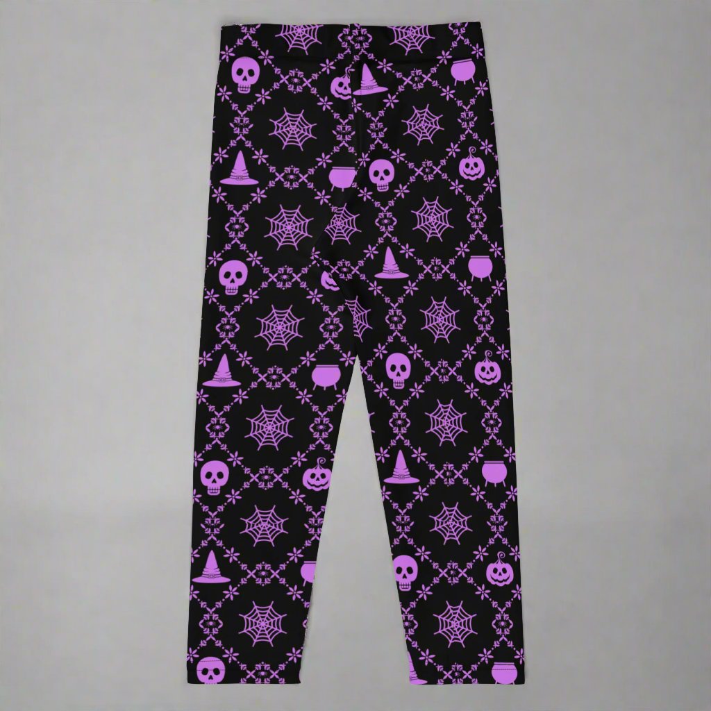 Wickedly Cute Toddler & Kids Halloween Leggings, featuring a black material with a purple geometric pattern that consists of spiders webs, pumpkins, witches hats and skulls, by jaecrece.com