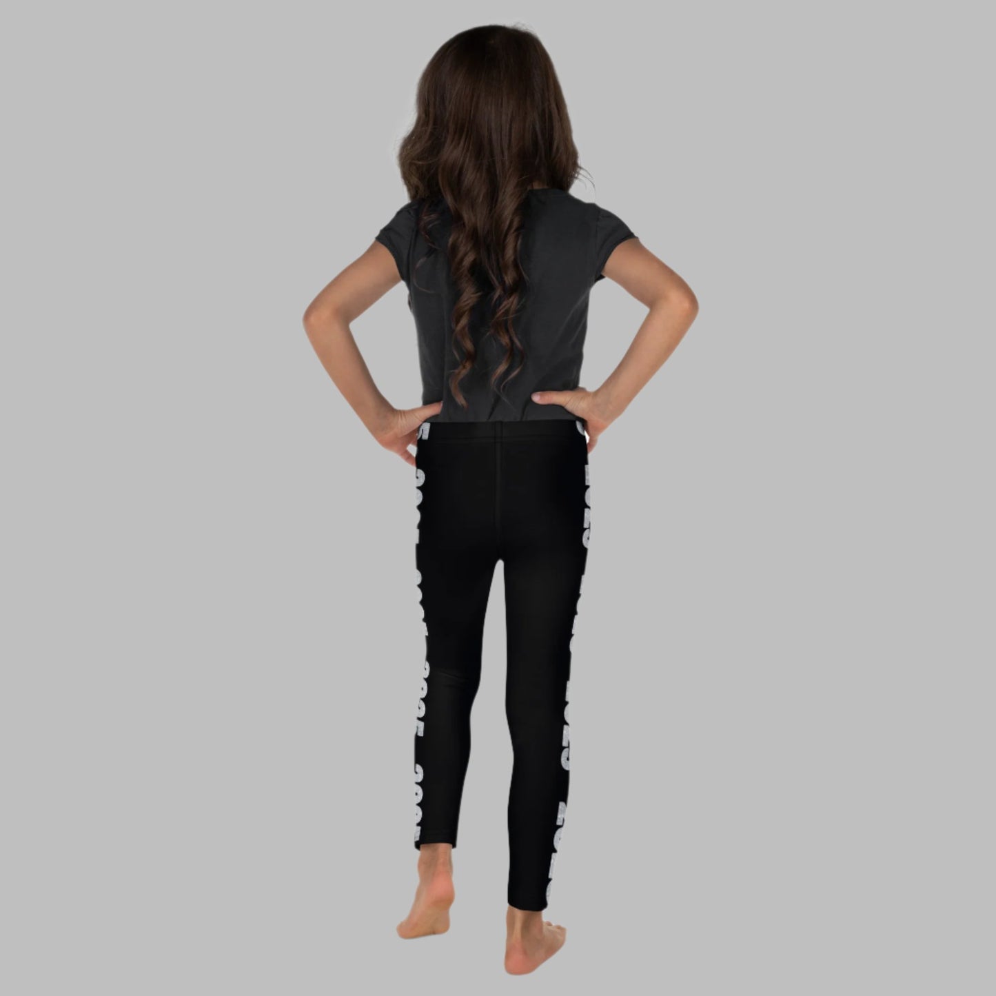 2025 Leggings for Happy New Year Party Celebration or a gift for graduating class of 2025. Black yoga pants have large repeating silver 2025 running down the outside of each leg. Tights are available in toddler and girls child sizes 2T-7, by jaecrece