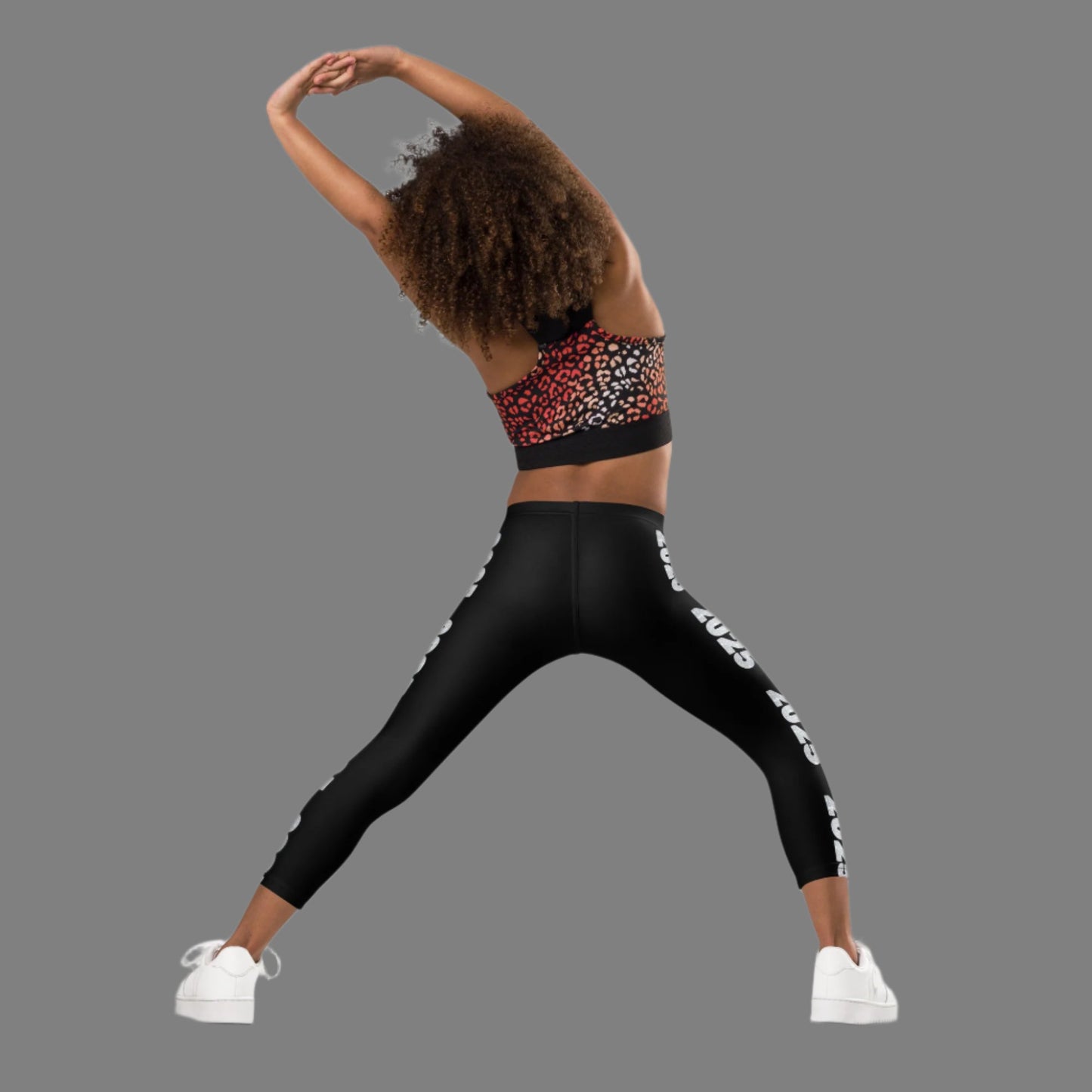 2025 Leggings for Happy New Year Party Celebration or a gift for graduating class of 2025. Black yoga pants have large repeating silver 2025 running down the outside of each leg. Tights are available in toddler and girls child sizes 2T-7, by jaecrece