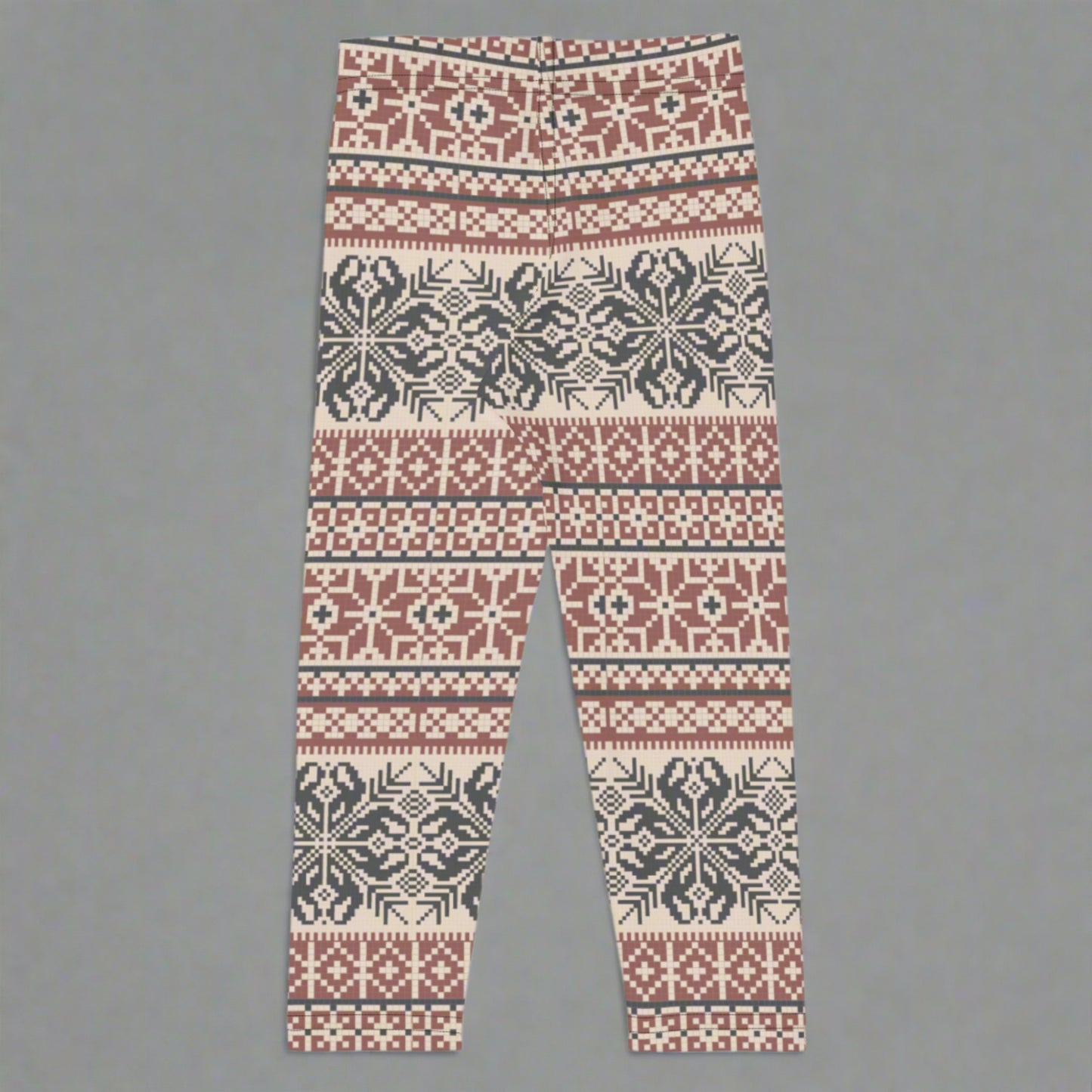 Image: Fair Isle Girls Leggings with a Nordic Snowflake pattern in cream, maroon and navy blue. Scandi Active wear yoga pants in child an toddler sizes 2T-7,  by jaecrece