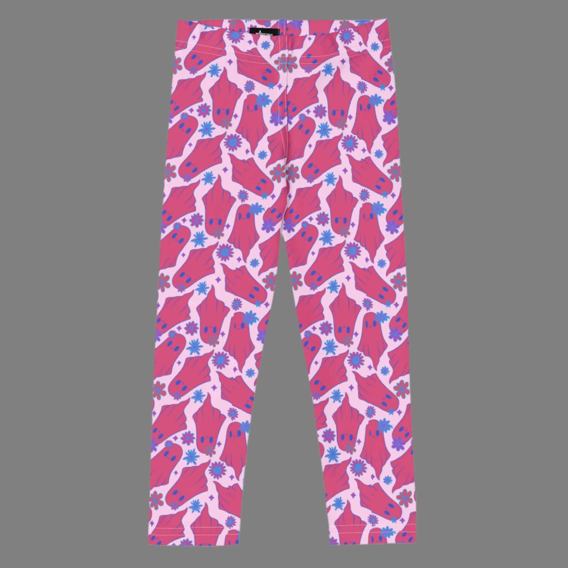 Cute Ghosts with Flowers Halloween Toddler Leggings. These kids yoga pants are light pink, with adorable hot pink ghosts with blue flowers. The perfect pants for Trick or Treating or a Spooky School outfit. Available in 2T, 3T, 4T, 5T, 6, 6X and 7, by jaecrece