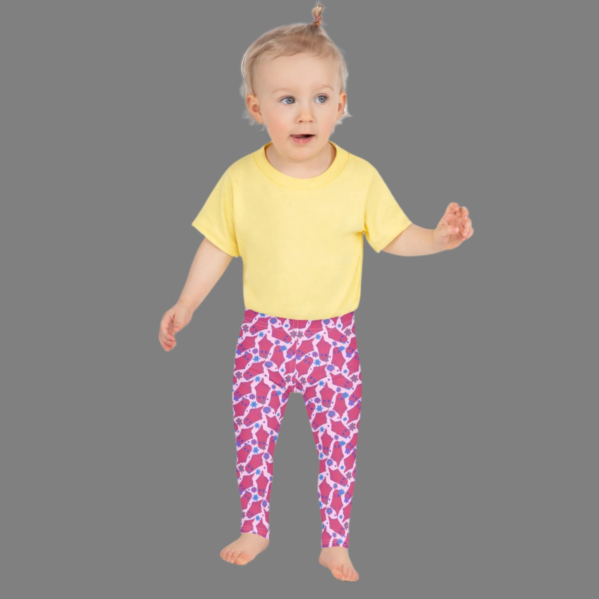 Cute Ghosts with Flowers Halloween Toddler Leggings. These kids yoga pants are light pink, with adorable hot pink ghosts with blue flowers. The perfect pants for Trick or Treating or a Spooky School outfit. Available in 2T, 3T, 4T, 5T, 6, 6X and 7, by jaecrece