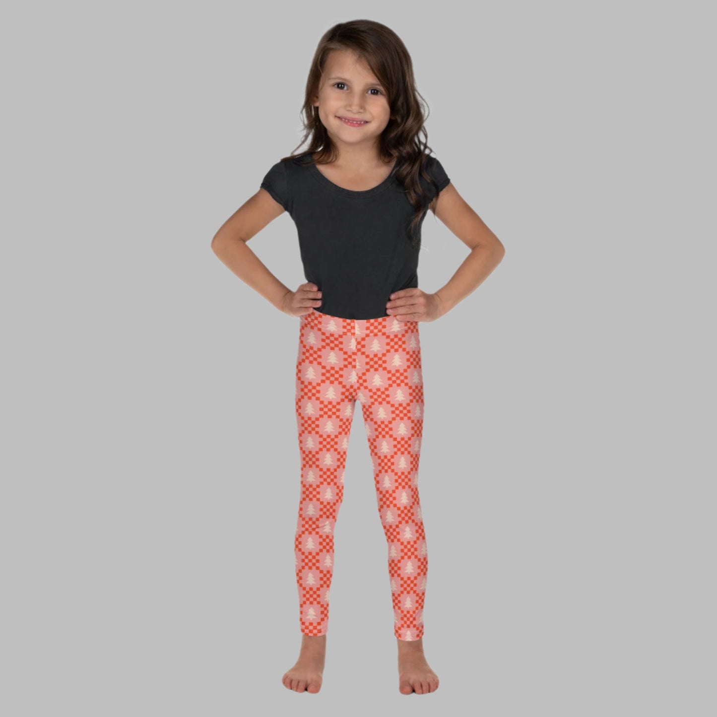 Pink Red Christmas Leggings in sizes Toddler 2T, 3T, 4T, 5T 6, 6X and 7. These tights have a red and pink check geometric design with light pink Christmas trees. Great gift for mom, toddler, tweens and teens. Mommy and me matching outfit, by jaecrece