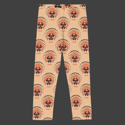 Thanksgiving Turkey Love Toddler leggings. These yoga pants are peach, and have a repeating pattern of turkeys showing the love sign with their hands. These girls child tights make a great gift, or a family matching outfit for the Turkey Trot! by jaecrece