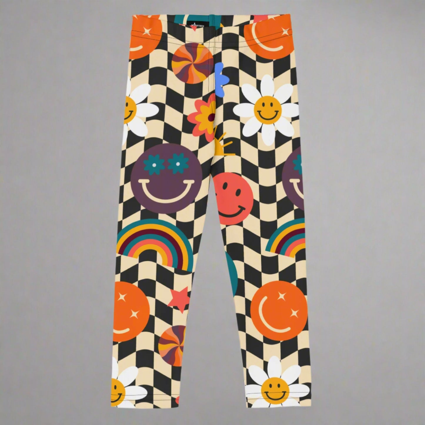 Image: Retro Checkerboard Girls Leggings, in size 2T-7. These toddler and kids yoga pants feature a black and khaki vintage check pattern with smiley faces, daisies, rainbows and suns. These vintage tights make a great birthday present, birthday gift, and are great for back to school, by jaecrece