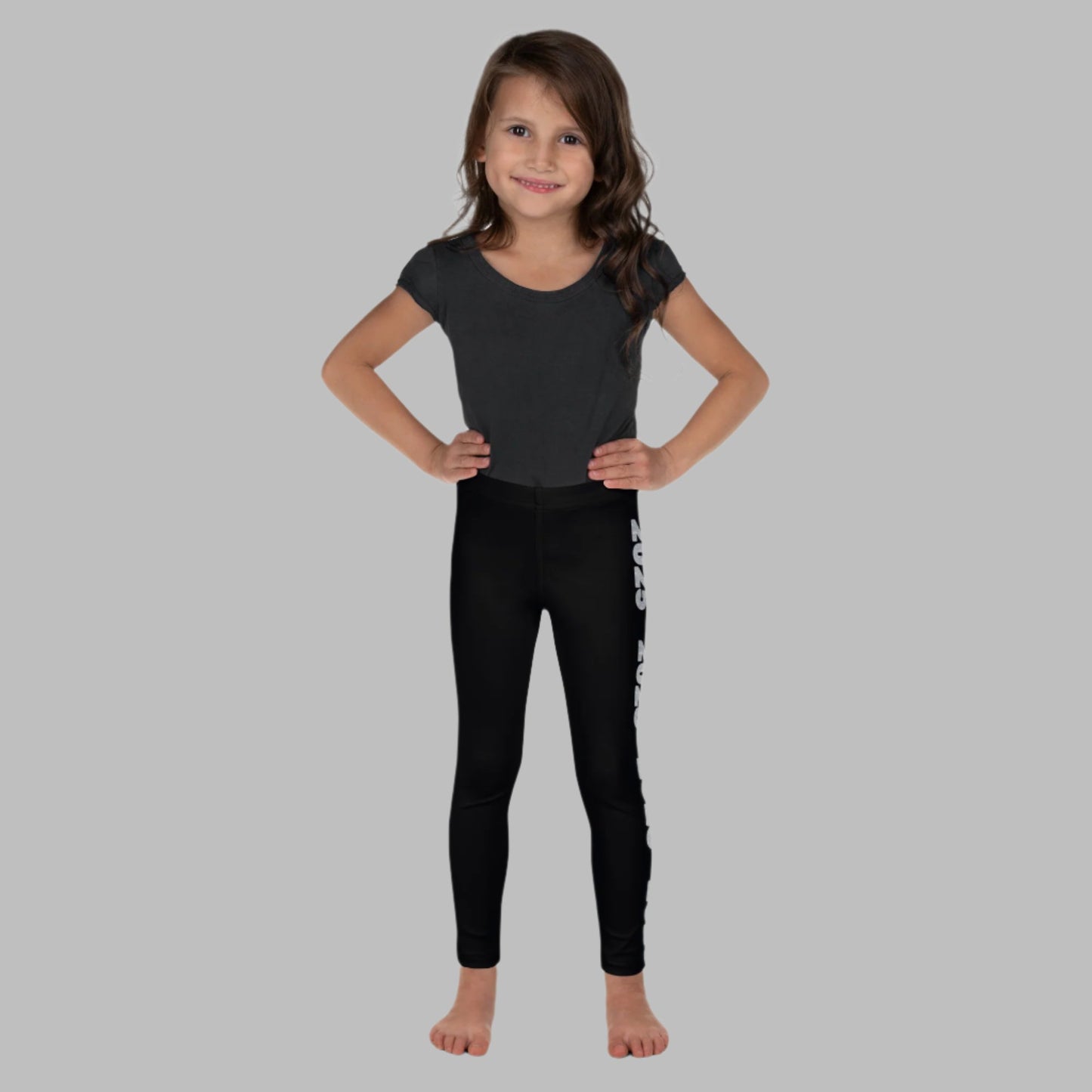 2025 Leggings for Happy New Year Party Celebration or a gift for graduating class of 2025. Black yoga pants have large repeating silver 2025 running down the outside of each leg. Tights are available in toddler and girls child sizes 2T-7, by jaecrece