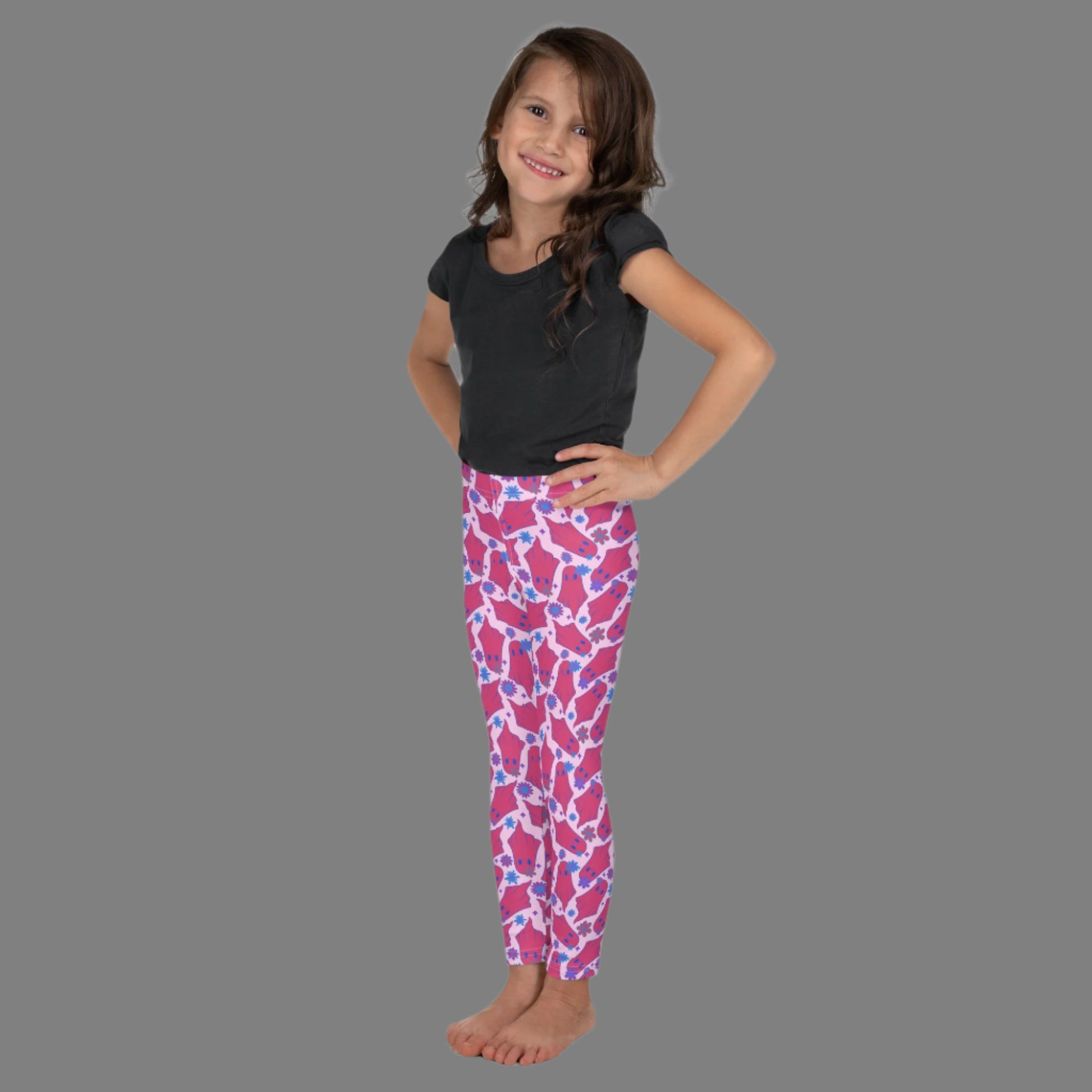 Cute Ghosts with Flowers Halloween Toddler Leggings. These kids yoga pants are light pink, with adorable hot pink ghosts with blue flowers. The perfect pants for Trick or Treating or a Spooky School outfit. Available in 2T, 3T, 4T, 5T, 6, 6X and 7, by jaecrece