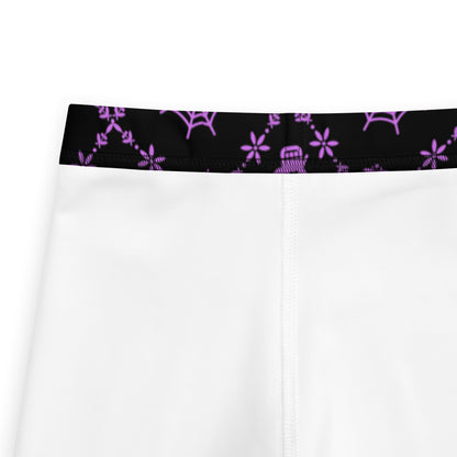 Wickedly Cute Toddler & Kids Halloween Leggings, featuring a black material with a purple geometric pattern that consists of spiders webs, pumpkins, witches hats and skulls, by jaecrece.com