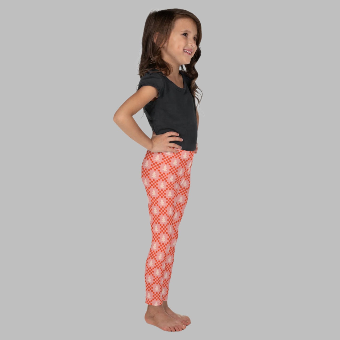 Pink Red Christmas Leggings in sizes Toddler 2T, 3T, 4T, 5T 6, 6X and 7. These tights have a red and pink check geometric design with light pink Christmas trees. Great gift for mom, toddler, tweens and teens. Mommy and me matching outfit, by jaecrece