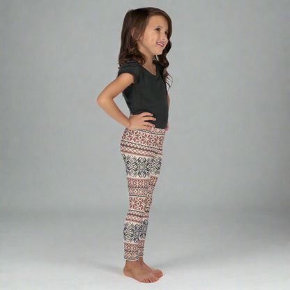 Image: Fair Isle Girls Leggings with a Nordic Snowflake pattern in cream, maroon and navy blue. Scandi Active wear yoga pants in child an toddler sizes 2T-7,  by jaecrece