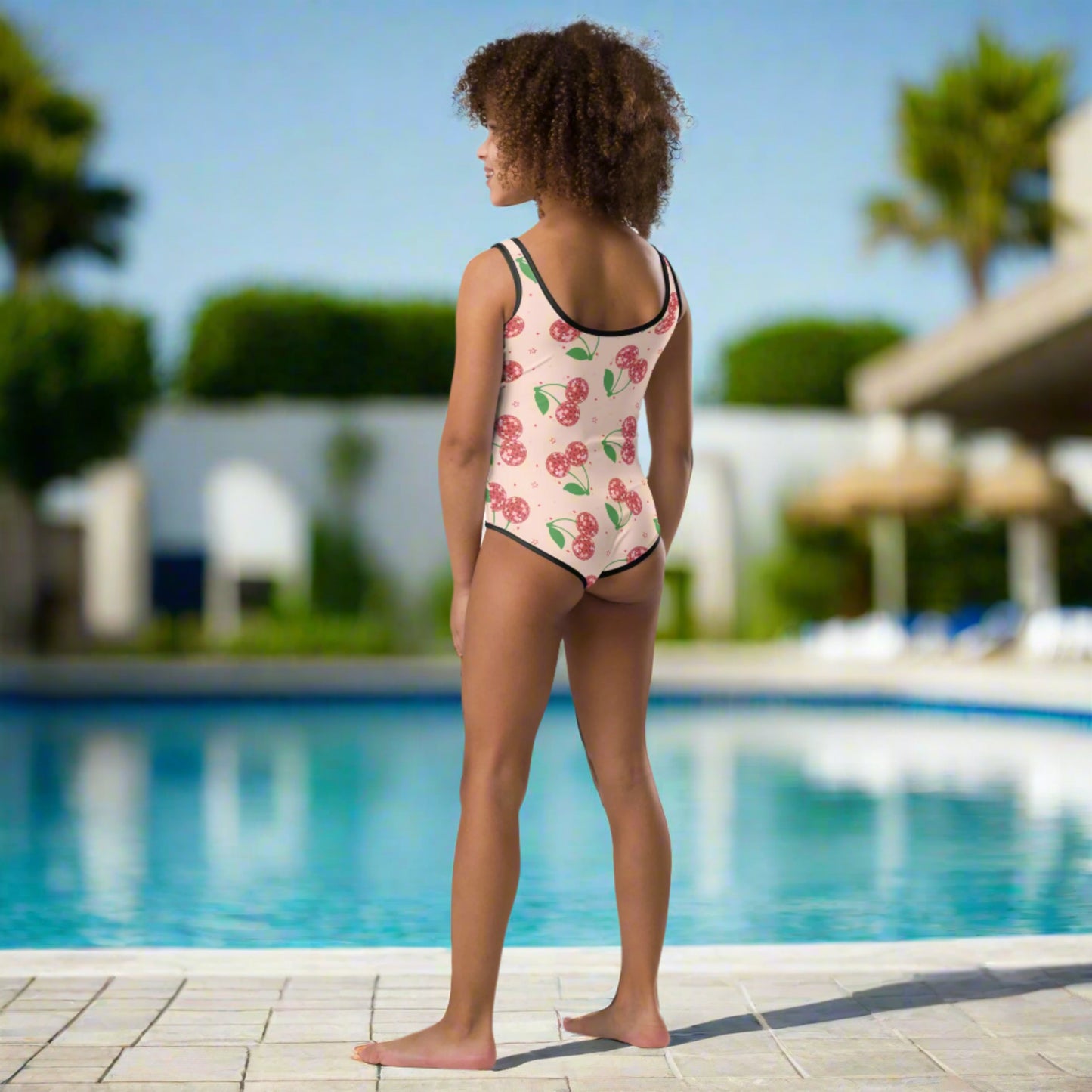 Image: Disco Cherries Kids  One Piece Swimsuit n sizes 2T-7, This fruit inspired swimsuit is a part of our Family Matching Swimwear Collection, and features a pink background with red disco ball cherries and stars, by jaecrece