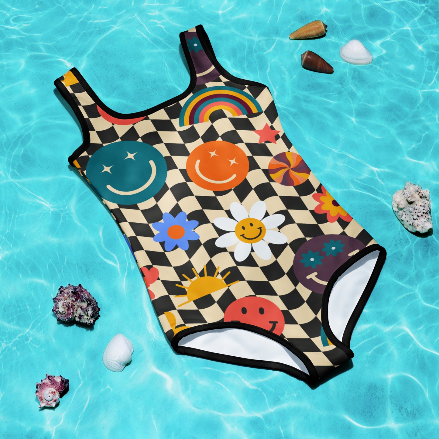 Smiley Face Checkerboard Girls One Piece Bathing Suit. This cute retro swimsuit features a black and khaki checkerboard background, with smiley face, rainbow and daisy graphics. In toddler and girls sizes, 2T-7. by jaecrece.com