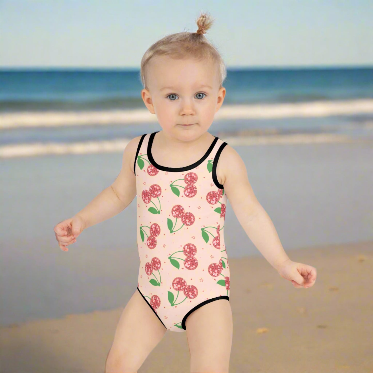 Image: Disco Cherries Kids  One Piece Swimsuit n sizes 2T-7, This fruit inspired swimsuit is a part of our Family Matching Swimwear Collection, and features a pink background with red disco ball cherries and stars, by jaecrece