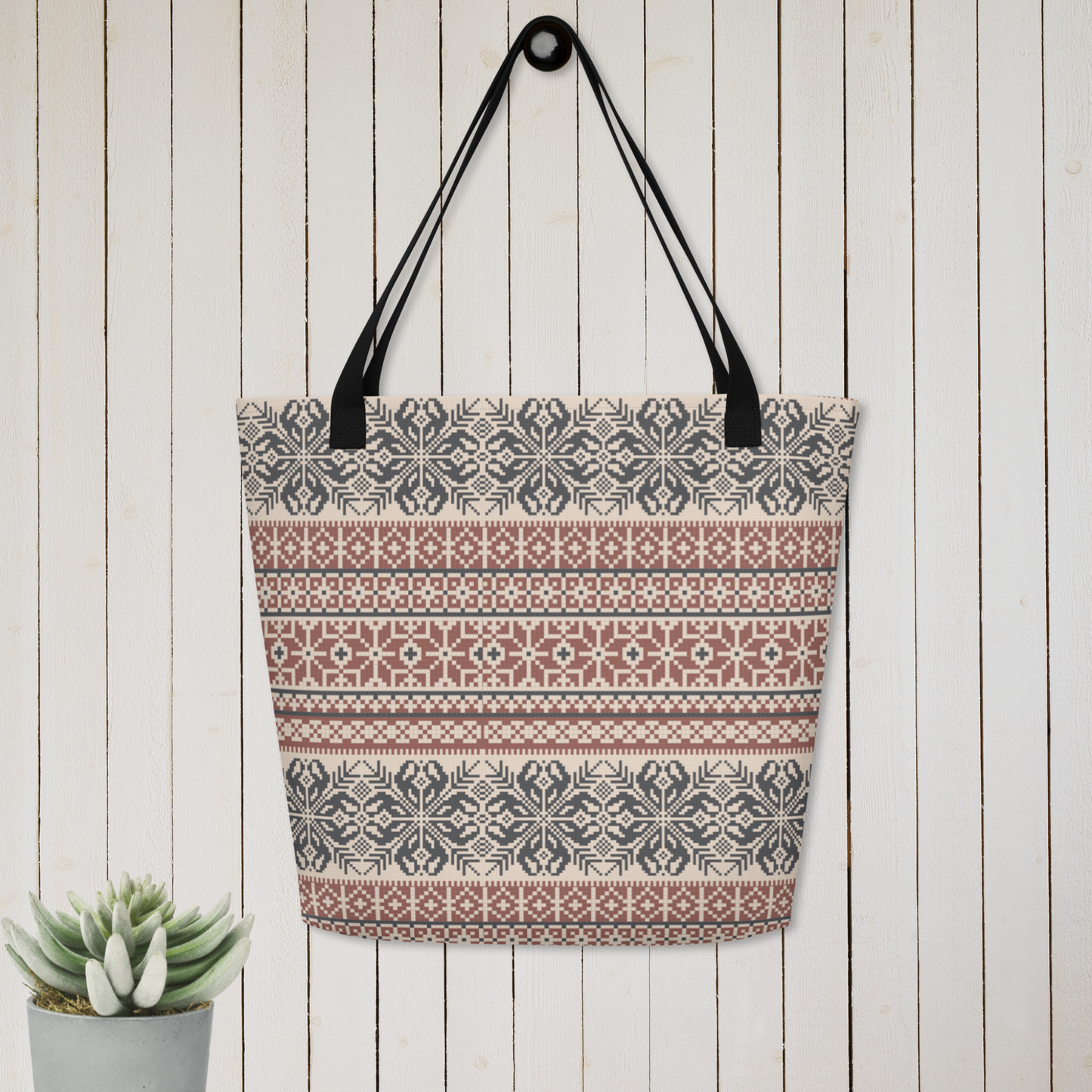 Image: Fair Isle Tote bag in shades of burgundy and navy. This winter carryall has a Nordic pattern of flowers and snowflakes, by jaecrece