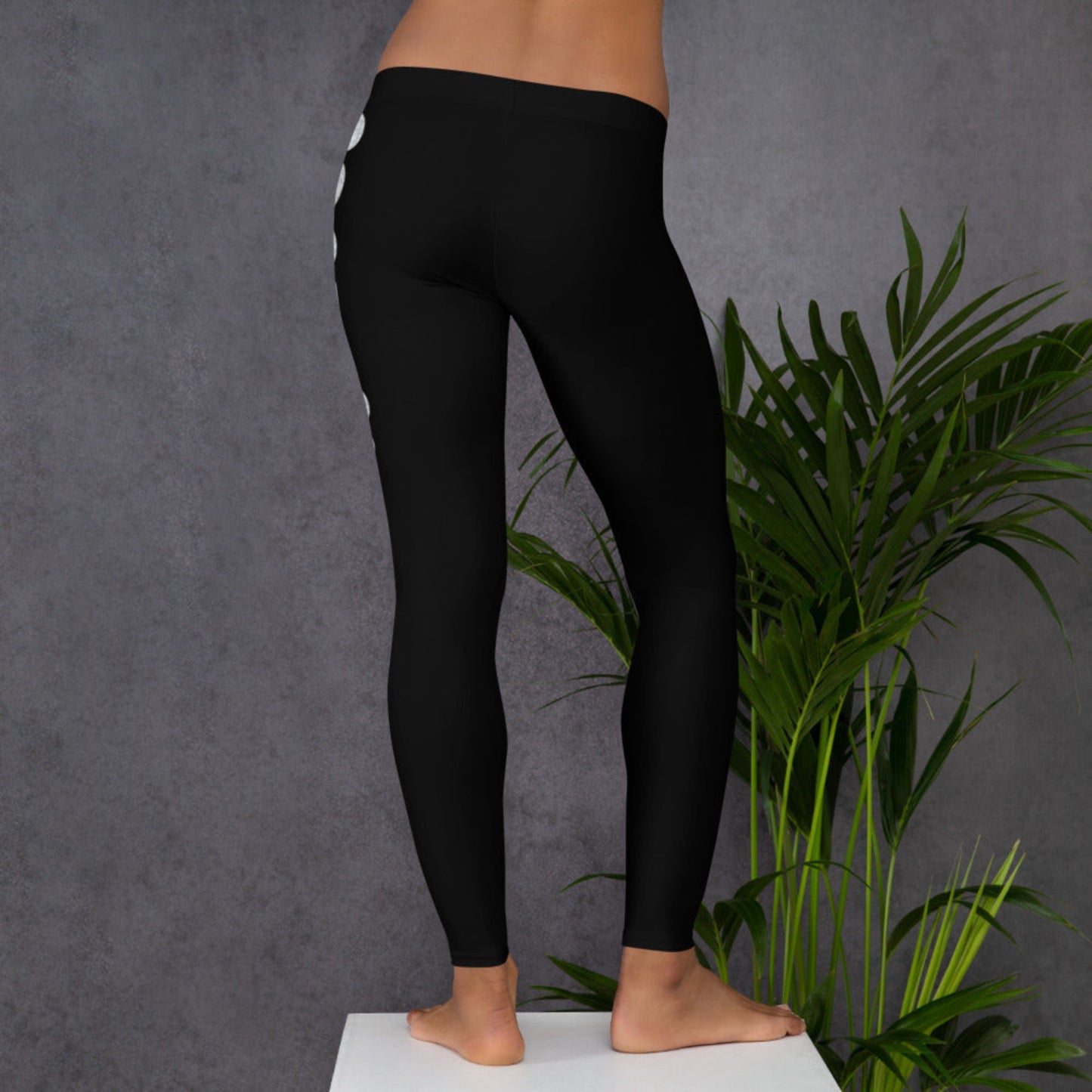 2025 Leggings for Happy New Year Party Celebration or a gift for graduating class of 2025. Black yoga pants have large repeating silver 2025 running down the outside of each leg. Tights are available in women / ladies sizes XS-XL, by jaecrece