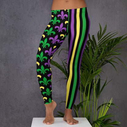 Alt text: Mardi Gras leggings for toddler girls, tweens, and women. Featuring a black background, one leg has bold gold, green, and purple stripes, while the other showcases a fleur-de-lis pattern. Perfect for celebrating New Orleans style with festive flair.