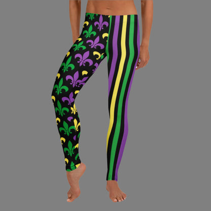 Alt text: Mardi Gras leggings for toddler girls, tweens, and women. Featuring a black background, one leg has bold gold, green, and purple stripes, while the other showcases a fleur-de-lis pattern. Perfect for celebrating New Orleans style with festive flair.