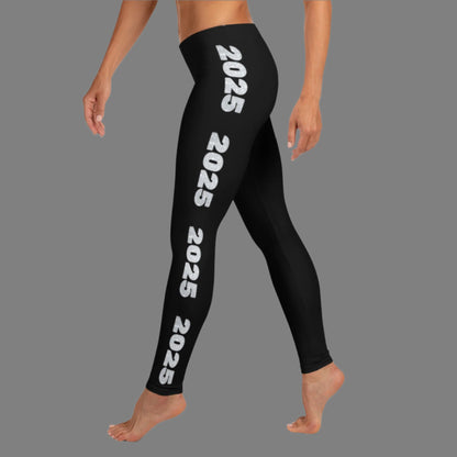 2025 Leggings for Happy New Year Party Celebration or a gift for graduating class of 2025. Black yoga pants have large repeating silver 2025 running down the outside of each leg. Tights are available in women / ladies sizes XS-XL, by jaecrece