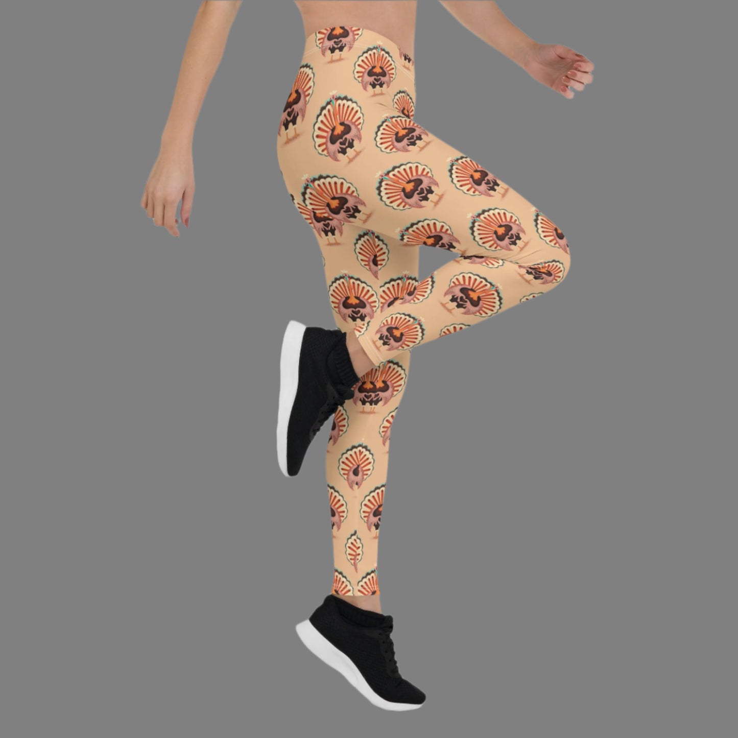 Thanksgiving Turkey Love ladies leggings. These womens yoga pants are peach, and have a repeating pattern of turkeys showing the love sign with their hands. These womens tights make a great gift, or a family matching outfit for the Turkey Trot! by jaecrece