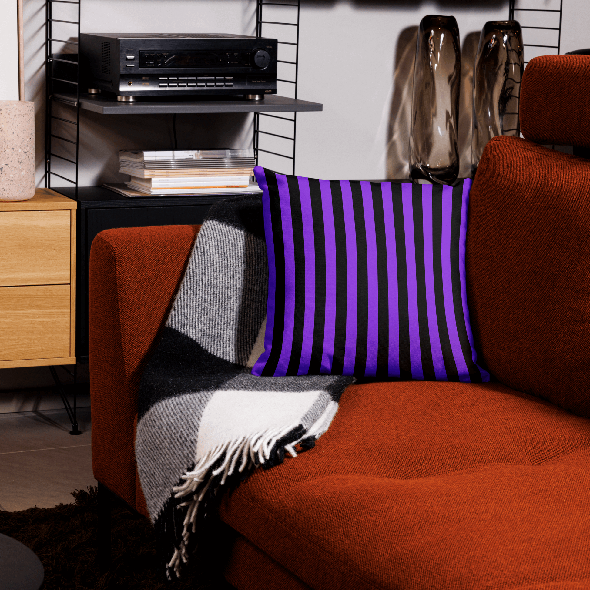 Our Cute Ghosts Halloween throw pillow has a different print on each side. One side is purple with black ghosts, and the other side is black and purple stripes. This accent pillow is the perfect home decor spooky gift for the Halloween season. by jaecrece