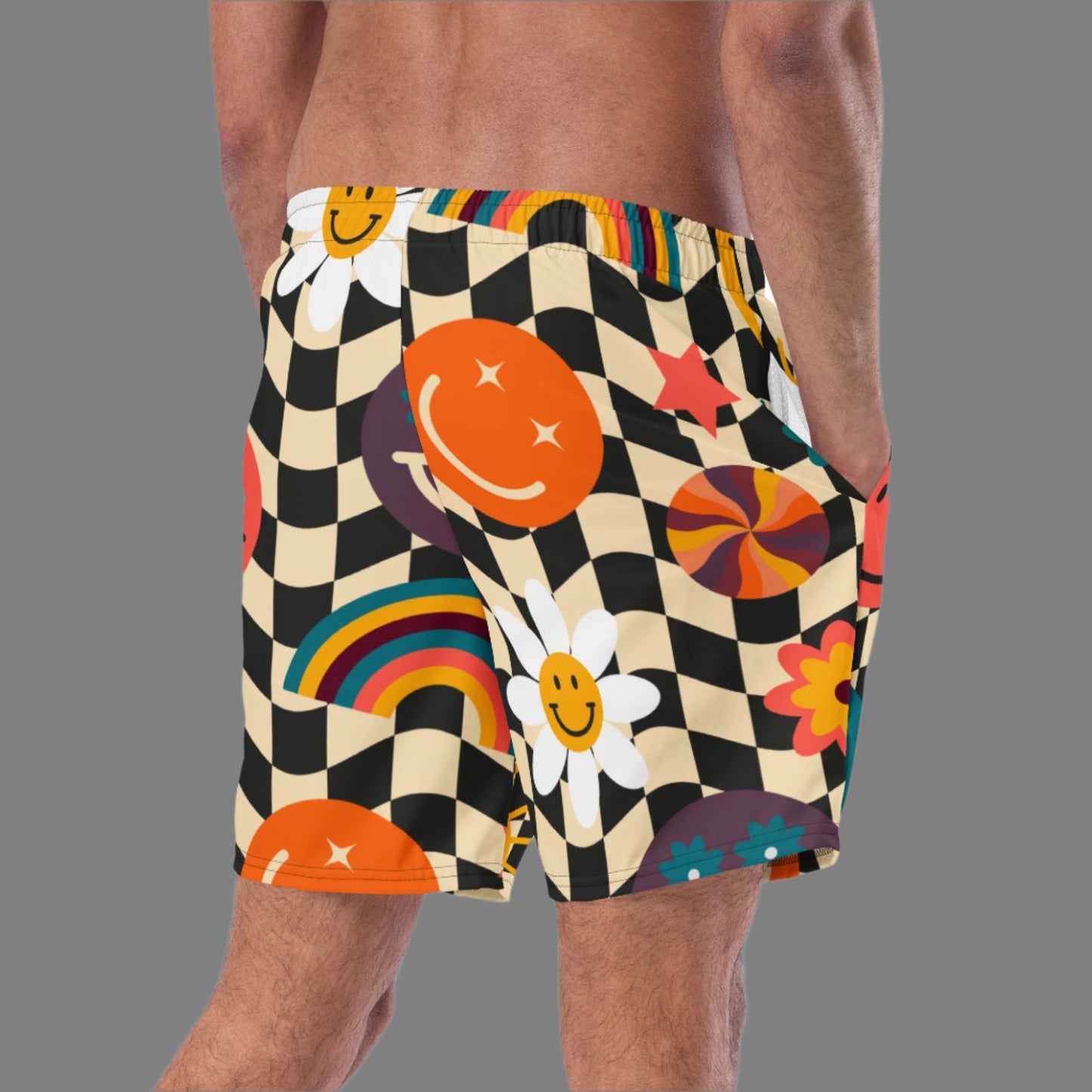 Smiley Face Checkerboard Mens Recycled Swim Trunks Family Matching Swim Wear Groovy Style Bathing Suit. These swim trunks feature a retro smiley face checkerboard pattern, with flowers and rainbows by jaecrece.com