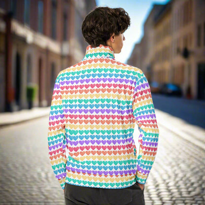 Image: Rainbow Hearts Unisex Track Jacket. This lightweight athletic coat has rows of hearts in the color of the rainbow. Great active wear jacket for Valentines Day or LGBTQ Pride parades, by jaecrece