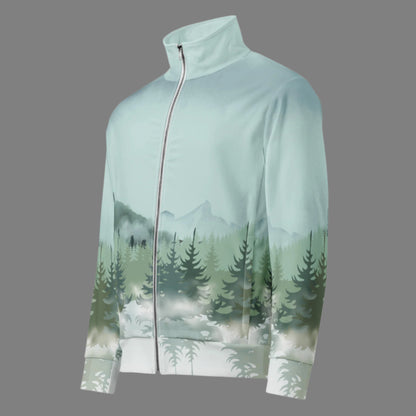 Image: Winter Forest Unisex Track Jacket. This nature inspired workout jacket has an ombre snowy mountain print that fades from a blue gray sky to mountains and pine trees to white snow. Suitable for men and women, by jaecrece