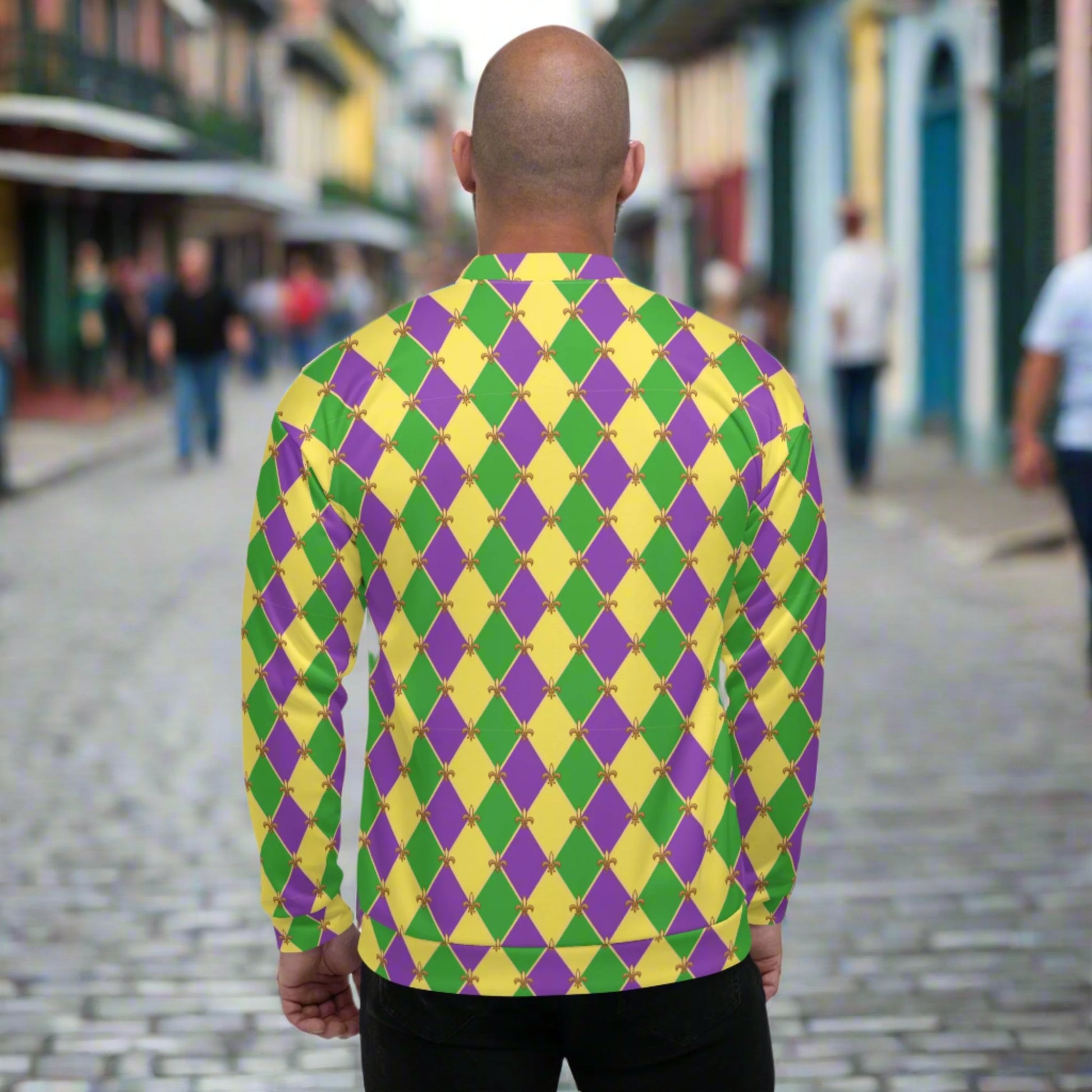 Image: Unisex bomber jacket, with a gold, green and purple diamond fleur de lis pattern. Perfect for your New Orleans Mardi gras parade, the French Quarter, or anywhere you want to be the life of the party, by jaecrece