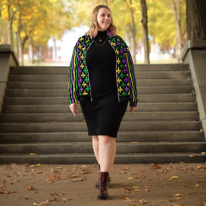 Image: Mardi Gras Unisex Bomber Jacket. This lightweight NOLA apparel is perfect for parades in the French Quarter, or Mardi Gras themed fun runs. It features a gold, green and purple fleur de lis pattern on the front and back, with gold, purple and green stripes going down each arm. Plus sizes available, by jaecrece